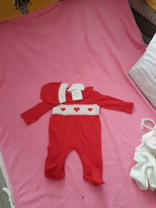 red loveheart babygro with matching hat