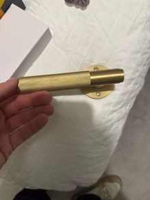 New knurled brass door handle
