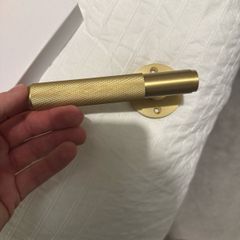 New knurled brass door handle