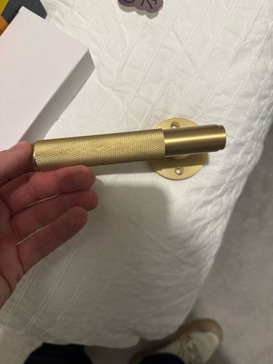 New knurled brass door handle