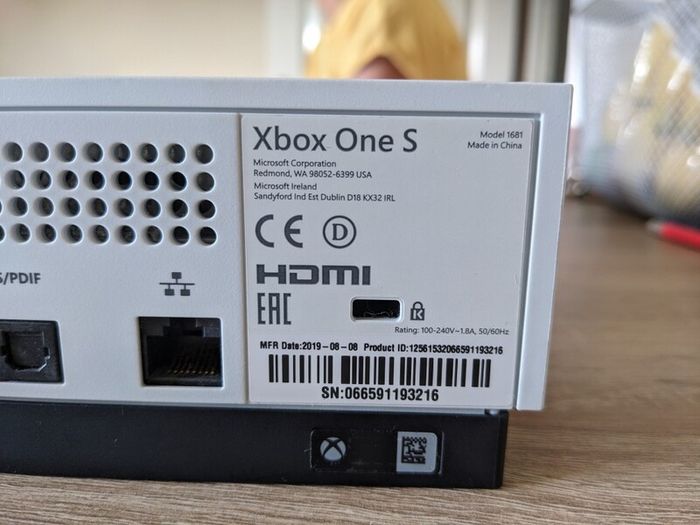 Xbox One S 1TB with controller and cables.