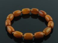 main image for ad Luxury rare dark beeswax genuine Baltic amber beaded elastic bracelet with gold plated spacers vintage jewellery bracelets