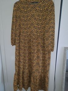 ladies new with tags yellow and black print dress open to offers