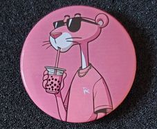 Pink panther, pin back button badge.