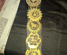 Set of Five Old Brass Horse Medallions on a black strap, a Commemorative 1911 King George V and Queen Mary design at the bottom, Postage Available