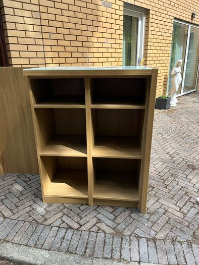 Veneered oak shelving unit with glass top