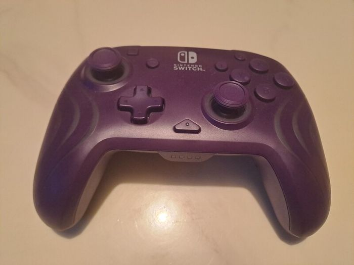 Nintendo Switch PDP Afterglow Wave Purple controller
