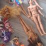 mixture of barbies, sullivian families and lols dolls Image 3
