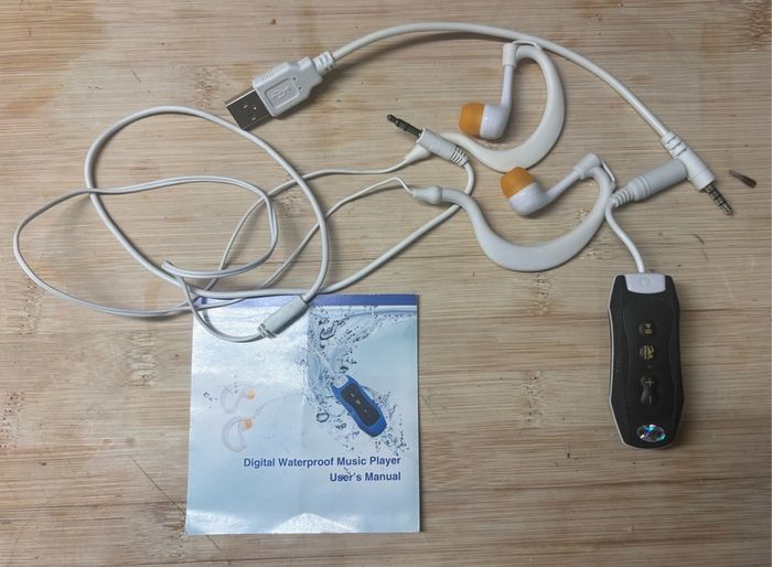 Brand New Digital Waterproof Music Player and Headphones