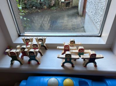 wooden acrobat figures