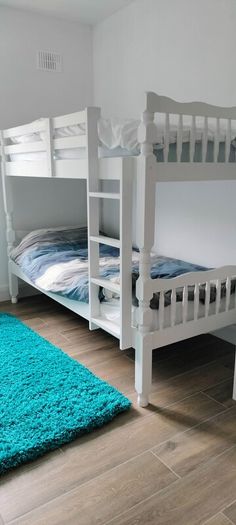 single wooden bunk bed. White