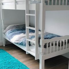 single wooden bunk bed. White