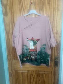 2 cute Tops size 16/18  5e each