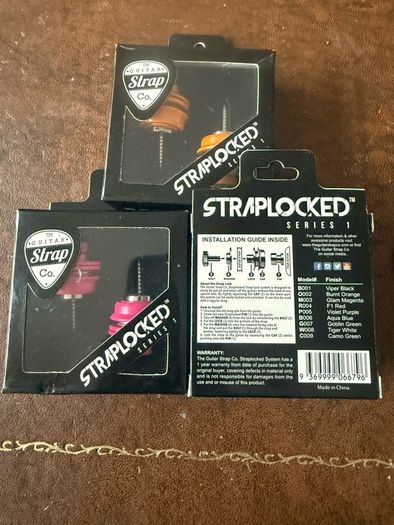 Guitar straplocks