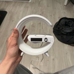 Wireless charger with a clock