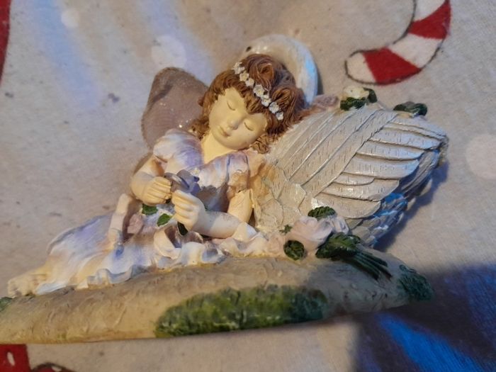 Fairy with swan ornament