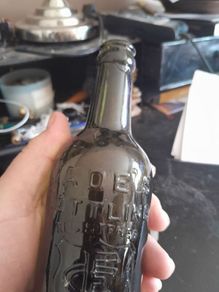 old cades cork bottle