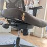 Black mesh office chair with adjustable armrests Image 3