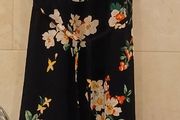 Long black summer dress with floral design.