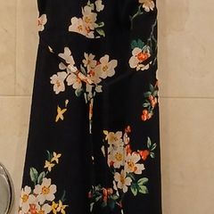Long black summer dress with floral design.