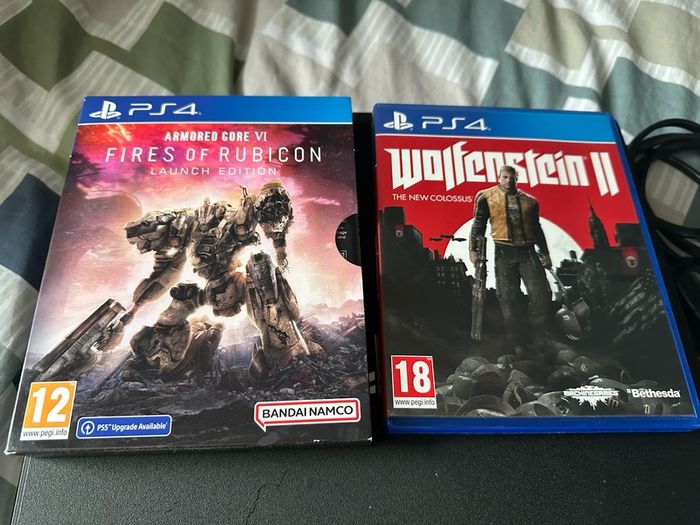 PlayStation 4 Pro 1TB SSD with games, cables and controller