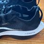 Nike Air Zoom Alphafly NEXT% 2 marathon racing shoes in black and white. Image 3