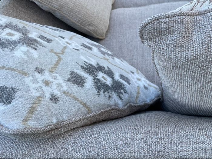 Beige L shaped corner sofa