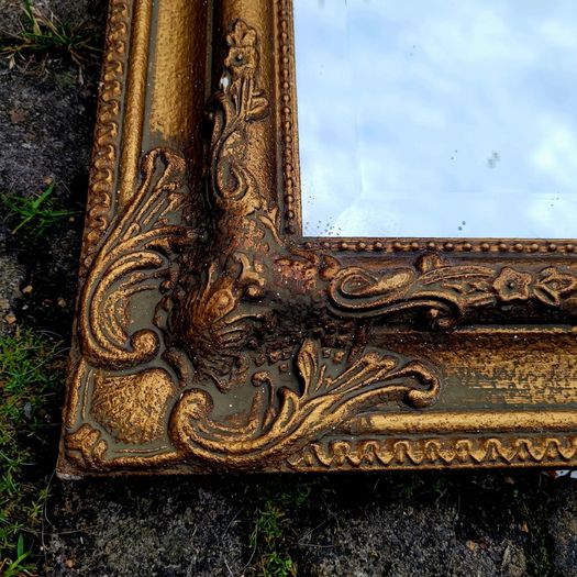 Vintage ornate gold mirror