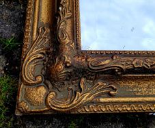Vintage ornate gold mirror