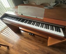 Casio Privia PX-720 Digital/Electric Piano in cherrywood