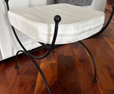 Cast iron foot stool with cushion