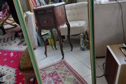 Vintage wall mirror in a green gold trimmed frame 1950s