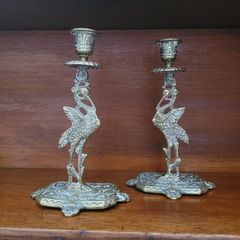 Antique brass crane candlesticks