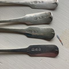 4 excellent condition Irish silver teaspoons 5 and 1/4 inches long weighing 65 grams. Made by Joseph Henzell in 1807 in Dublin.
