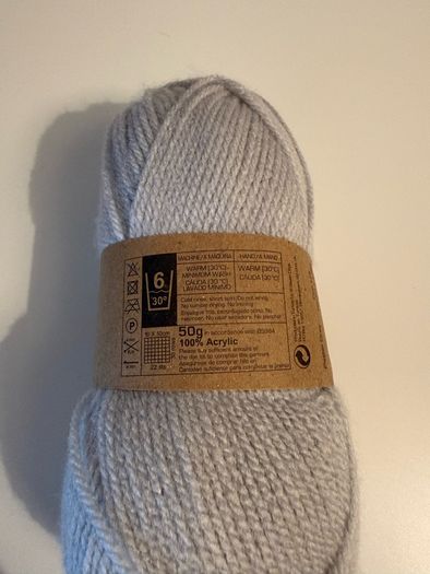 5 balls of grey yarn wool