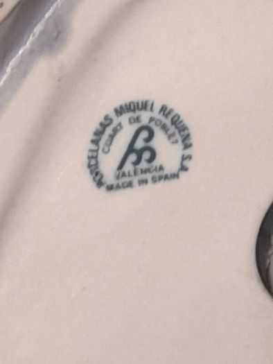 Old Ornament of a Boy in a Winter Hat and Light Colored Clothing on Skis, Made in Spain.