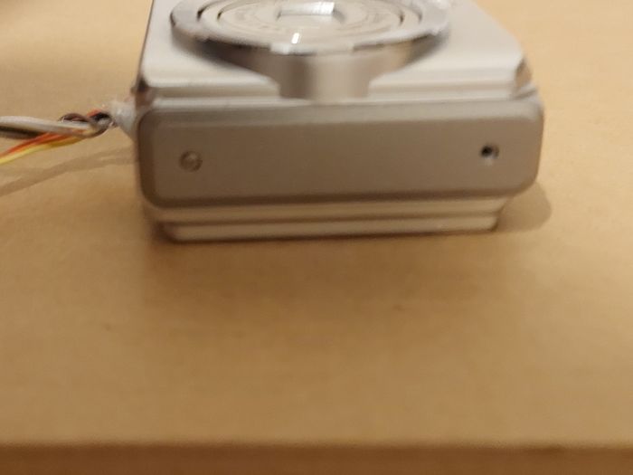Z880 Digital Camera, Takes 2AA Batteries, working fine, has a modification that doesn't affect its performance