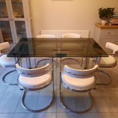 Table and 6 white leather chairs