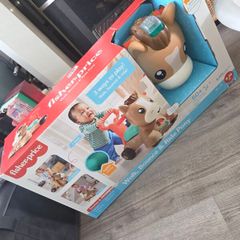 Fisher price ride on pony