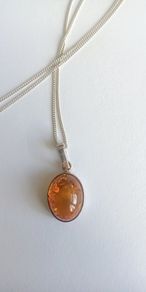Genuine amber oval pendant sterling silver necklace