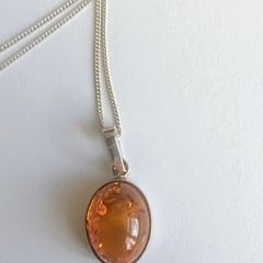 Genuine amber oval pendant sterling silver necklace