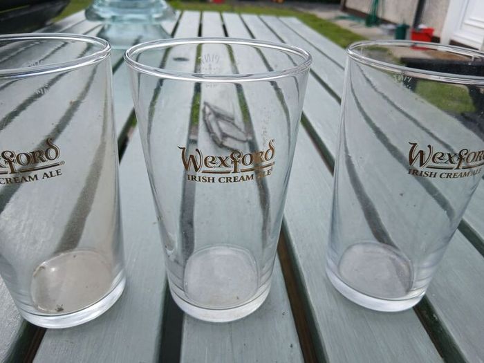 Three Wexford pint glasses