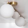 Modern Brass & Frosted Glass Globe Linear Ceiling Light Image 4