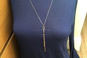 Long gold tone necklace