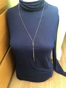 Long gold tone necklace