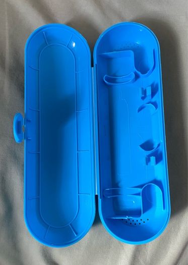 bright blue hard plastic electric toothbrush travel case (holds 1 handle and 2 brush heads) in clean, excellent condition