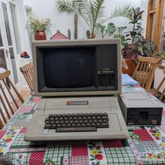 Vintage Apple II computer with Monitor III and Disk II drive