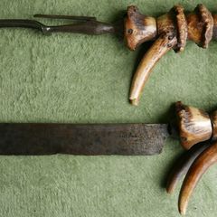 Vintage late 19th century Scottish novelty antler handled knife and fork , modelled as a deer with a face and brass tail, with a steel blade