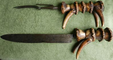 Vintage late 19th century Scottish novelty antler handled knife and fork , modelled as a deer with a face and brass tail, with a steel blade