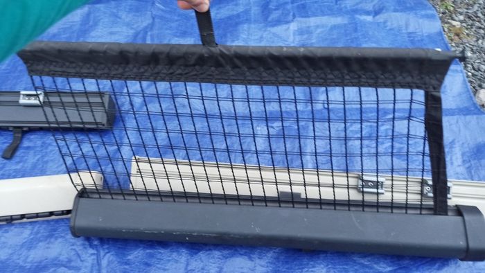 Volvo V60 & Volvo V70 cargo net for wagon models light cream & black colours available   Part Numbers: 9928200018 & 9928200019